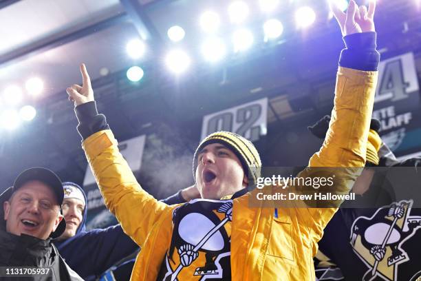 Fan celebrates during the game between the Philadelphia Flyers and the Pittsburgh Penguins in the second period during the 2019 Coors Light NHL...