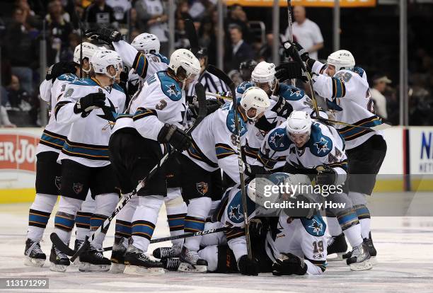 The San Jose Sharks celebrate after the game winning goal by Joe Thornton against the Los Angeles Kings in game six of the Western Conference...