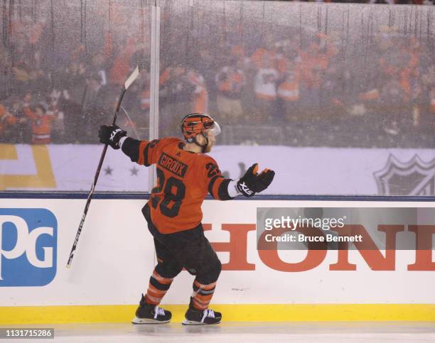 Claude Giroux of the Philadelphia Flyers scores the game winning goal at 1:59 of overtime against the Pittsburgh Penguins during the 2019 Coors Light...