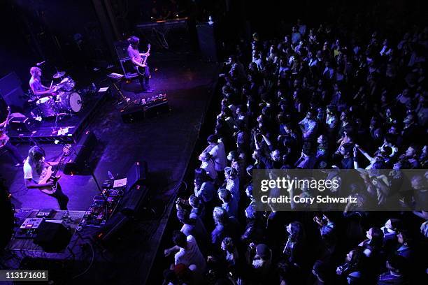 Kevin Parker, Nick Allbrook, Jay Watson and Dominic Simper of Tame Impala perform at Webster Hall on April 25, 2011 in New York City.