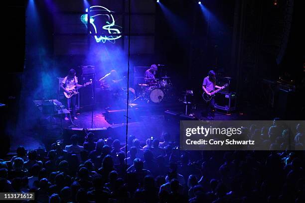 Kevin Parker, Nick Allbrook, Jay Watson and Dominic Simper of Tame Impala perform at Webster Hall on April 25, 2011 in New York City.