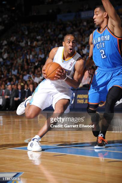 Arron Afflalo of the Denver Nuggets drives to the basket against Thabo Sefolosha of the Oklahoma City Thunder in Game Four of the Western Conference...