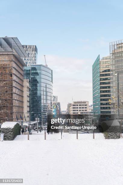 rue de la loi from schuman square - brussels square stockfoto's en -beelden