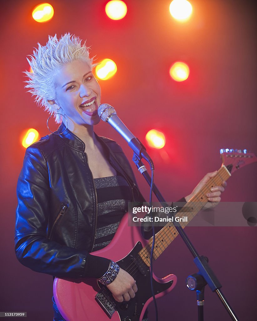 Punk Singer Guitarist Performing High-Res Stock Photo - Getty Images
