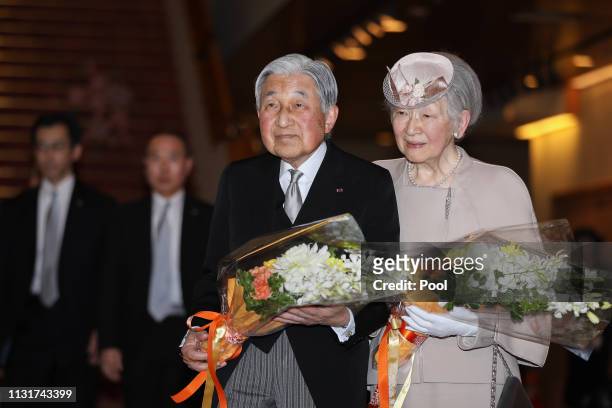 Japanese Emperor Akihito and Empress Michiko leave after attending the memorial ceremony in commemoration of the 30th anniversary of the Emperor's...