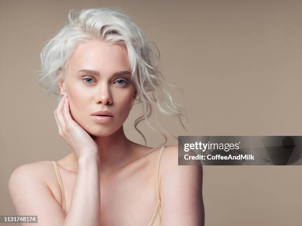 beautiful woman with make-up and stylish hairstyle - eye make up stock pictures, royalty-free photos & images