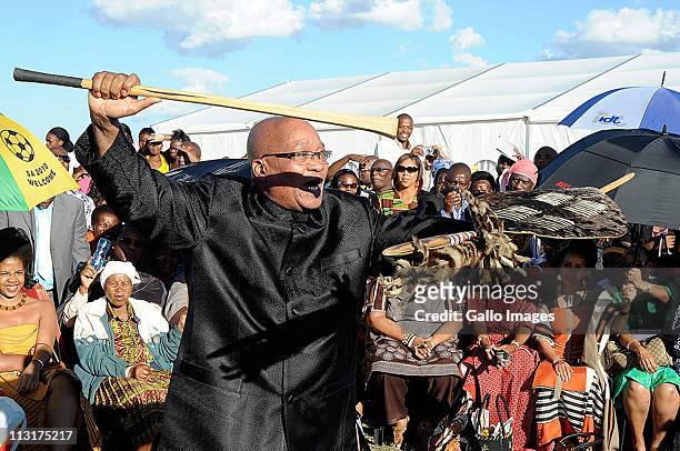 President Jacob Zuma performs during the traditional wedding ceremony for his daughter Duduzile Zuma and Lonwabo Sambudla, former head of Lembede...