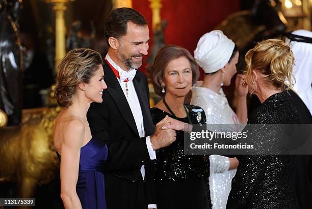 Princess Letizia of Spain and Prince Felipe of Spain and Queen Sofia of Spain receive actress Melanie Griffith at the Gala Dinner in honour of the...
