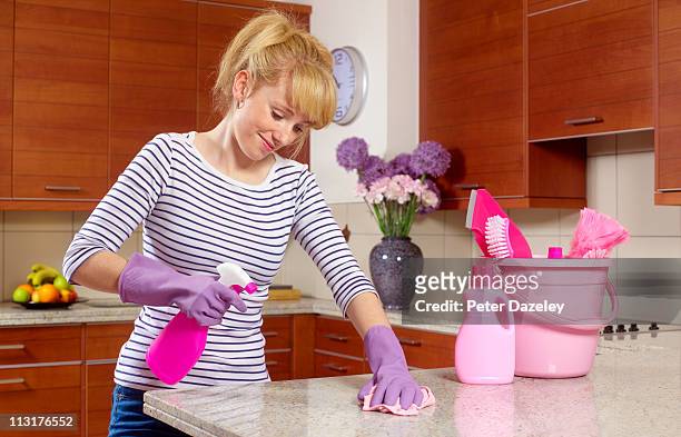 student spring cleaning - rosa handschuh stock-fotos und bilder