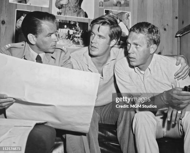 Frank Sinatra , George Peppard and Steve McQueen on the set of MGM's 'Never So Few' in 1959.