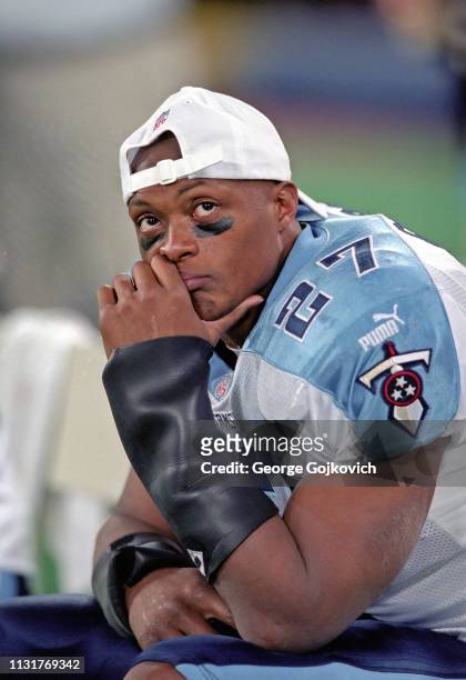 Running back Eddie George of the Tennessee Titans looks on from the sideline during a game against the Pittsburgh Steelers at Three Rivers Stadium on...