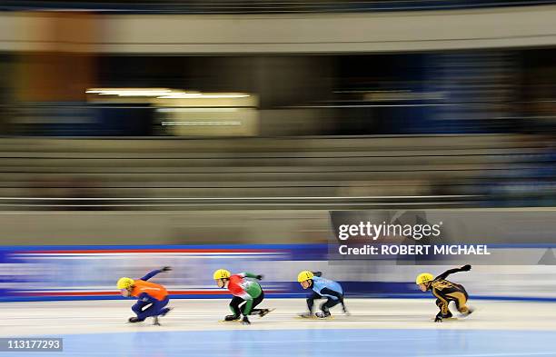 Daa Breeuwsama from Netherland, Vikor Knich of Hungary, Simon Cho of USA and Yuma Sakurai of Japan compete in the men's 500m preliminaries in the...