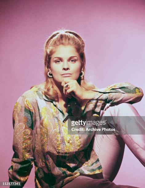 American actress and model Candice Bergen poses with her hand on her chin circa 1967.