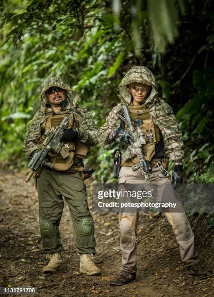 tactical military airsoft soldiers in jungle - spy hunter stock pictures, royalty-free photos & images