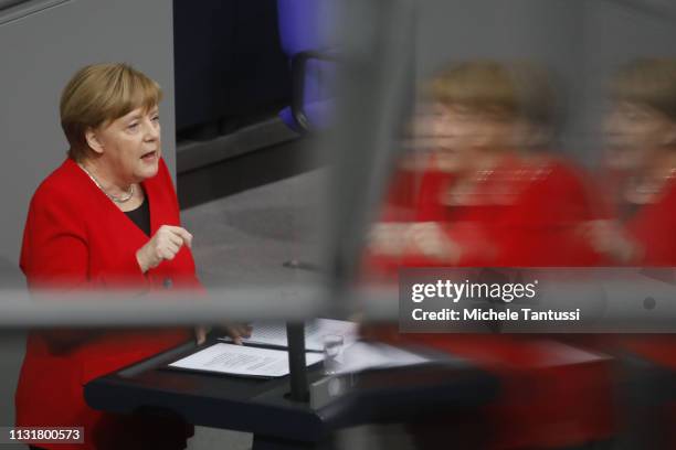 German Chancellor Angela Merkel gives a government declaration at the Bundestag before traveling to Brussels for a summit of European Union leaders...