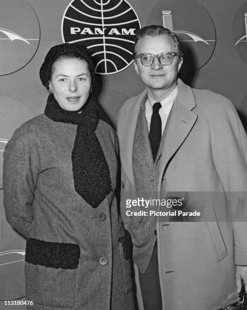 Swedish actress Ingrid Bergman with her husband theatre producer Lars Schmidt after arriving in New York from Paris in 1961.