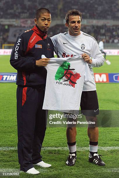 Alessandro Del Piero of Juventus FC and Takayuki Morimoto of Catania Calcio prior to the Serie A match between Juventus FC and Catania Calcio at...