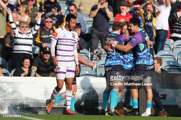 Tom Howe of Worcester Warriors is congratulated on his try during the Gallagher Premiership Rugby match between Worcester Warriors and Leicester...