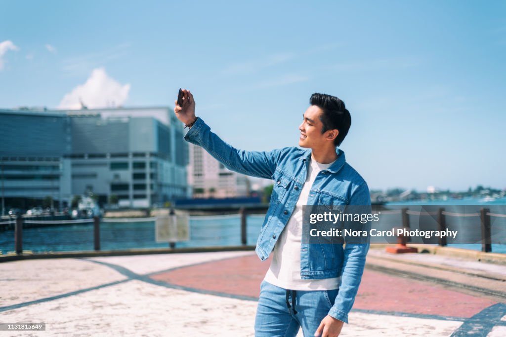 Man Taking selfie with Smart Phone