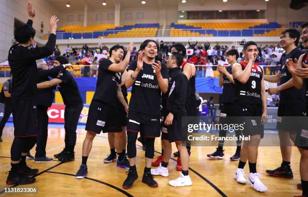 Players of Japan celebrates victory after the FIBA Basketball World Cup 2019 Asian Qualifier between Qatar and Japan at Al Gharrafa Sport Complex on...