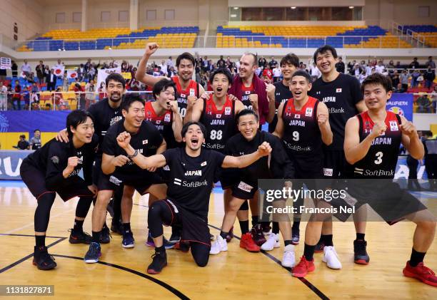 Players of Japan celebrates victory after the FIBA Basketball World Cup 2019 Asian Qualifier between Qatar and Japan at Al Gharrafa Sport Complex on...