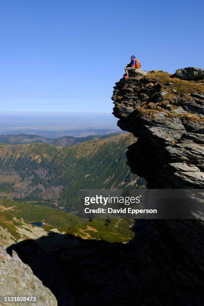 woman solo hiking in high tatras mountains of slovakia - tatra mountains stock pictures, royalty-free photos & images