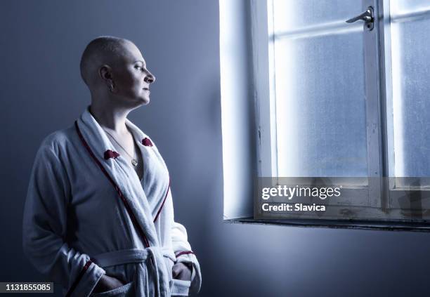 woman cancer patient in the hospital - uterine cancer stock pictures, royalty-free photos & images