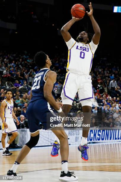 Tigers forward Naz Reid shoots the ball as Yale Bulldogs forward Jordan Bruner defends in the first round of the 2019 NCAA Photos via Getty Images...