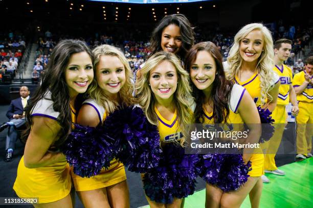Tigers cheerleaders pose for a picture during a game against the Yale Bulldogs in the first round of the 2019 NCAA Photos via Getty Images Men's...