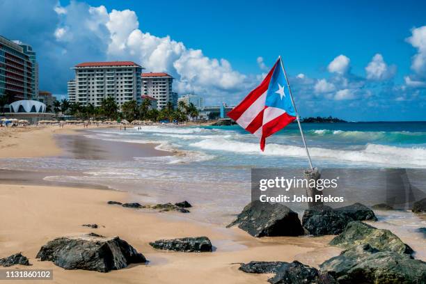 beach vacation in san juan, puerto rico - puerto rico stock pictures, royalty-free photos & images