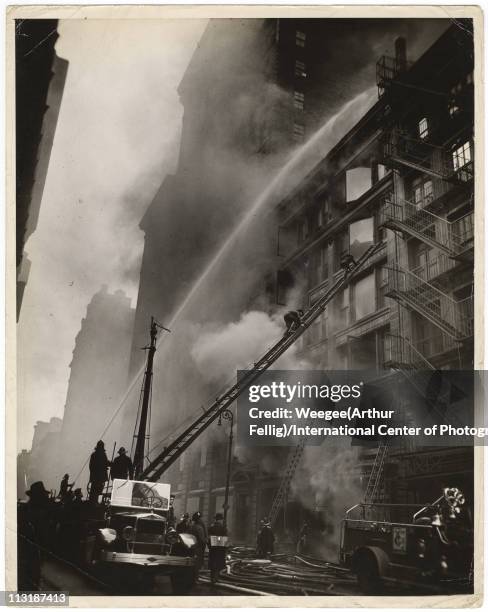 Loft Fire Fighting loft fire in downtown New York City, twentieth century ...