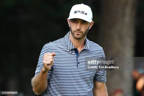 Dustin Johnson of the United States celebrates on the 18th green after making a par to win the World Golf Championships-Mexico Championship at Club...