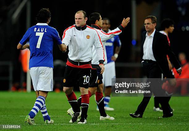 Wayne Rooney of Manchester United shakes hands with Raul of Schalke at the end of the UEFA Champions League Semi Final first leg match between FC...