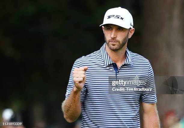 Dustin Johnson of the United States celebrates on the 18th green after making a par to win the World Golf Championships-Mexico Championship at Club...