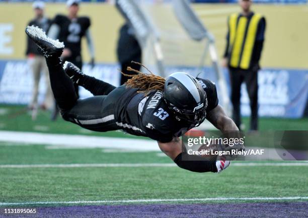 Trent Richardson of Birmingham Iron scores a touchdown against the Atlanta Legends during the third quarter of the Alliance of American Football game...