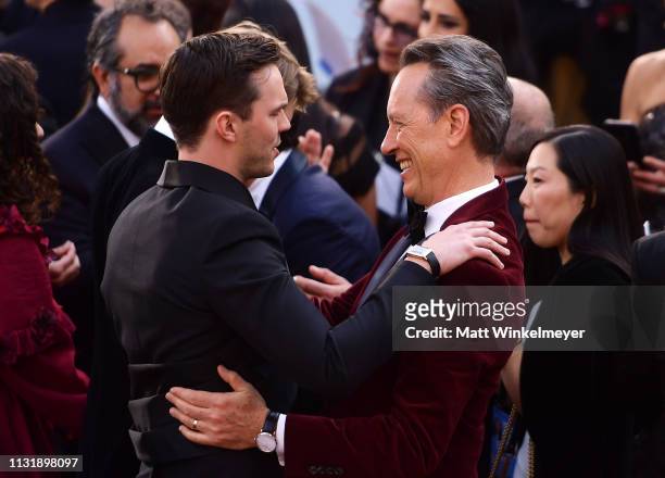 Nicholas Hoult and Richard E. Grant attend the 91st Annual Academy Awards at Hollywood and Highland on February 24, 2019 in Hollywood, California.