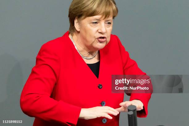 German Chancellor Angela Merkel gives a government declaration ahead of an EU summit during the 89th plenary session at Bundestag in Berlin on March...