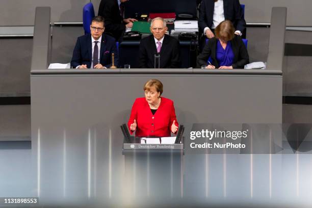 German Chancellor Angela Merkel gives a government declaration ahead of an EU summit during the 89th plenary session at Bundestag in Berlin on March...