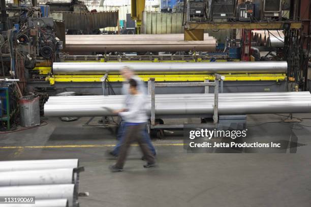 Factory Worker Rushing Busy Factory Blur Photos and Premium High Res Pictures - Getty Images