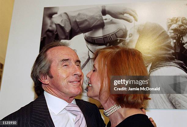 Sir Jackie and Lady Helen Stewart at the F1 " A Photographic History" evening at the Proud Gallery in Camden, London on July 2, 2002.