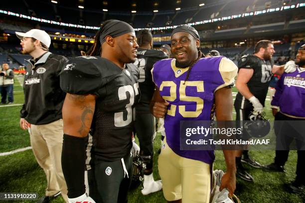 Trent Richardson of Birmingham Iron and Denard Robinson of Atlanta Legends speaks after the Alliance of American Football game at Georgia State...