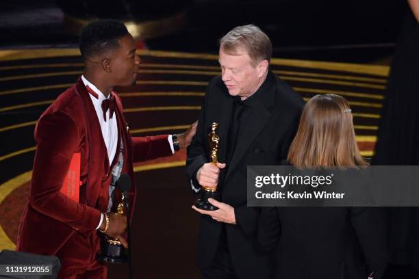 Stephan James presents the Makeup and Hairstyling award for 'Vice' to Greg Cannom onstage during the 91st Annual Academy Awards at Dolby Theatre on...