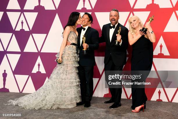 Elizabeth Chai Vasarhelyi, Jimmy Chin, Evan Hayes, and Shannon Dill, winners of Best Documentary Feature for "Free Solo," pose in the press room...