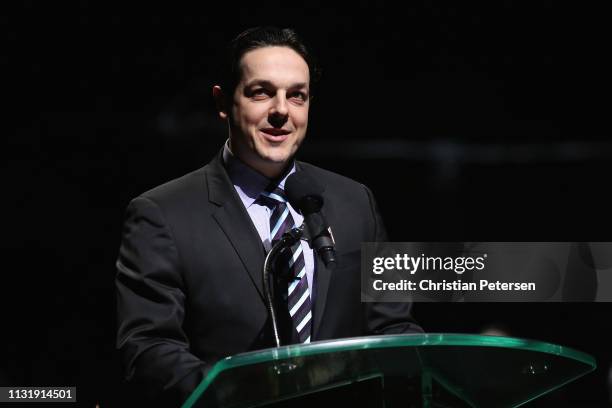 Former teammate Daniel Briere speaks during a pregame ceremony to honor Shane Doan and retire his jersey at Gila River Arena on February 24, 2019 in...
