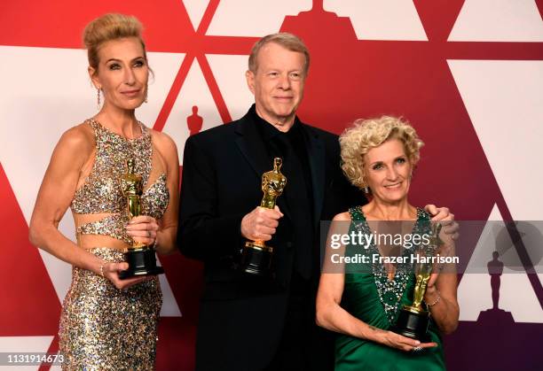 Kate Biscoe, Greg Cannom, and Patricia Dehaney, winners of Best Makeup and Hairstyling for "Vice," pose in the press room during the 91st Annual...