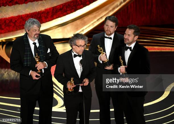 Ian Hunter, Paul Lambert, Tristan Myles, and J. D. Schwalm accept the Visual Effects award for 'First Man' onstage during the 91st Annual Academy...