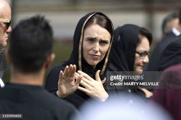 New Zealand's Prime Minister Jacinda Ardern gestures as she departs following a gathering for congregational Friday prayers and two minutes of...