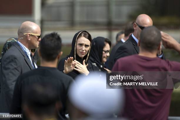 New Zealand's Prime Minister Jacinda Ardern gestures as she departs following a gathering for congregational Friday prayers and two minutes of...