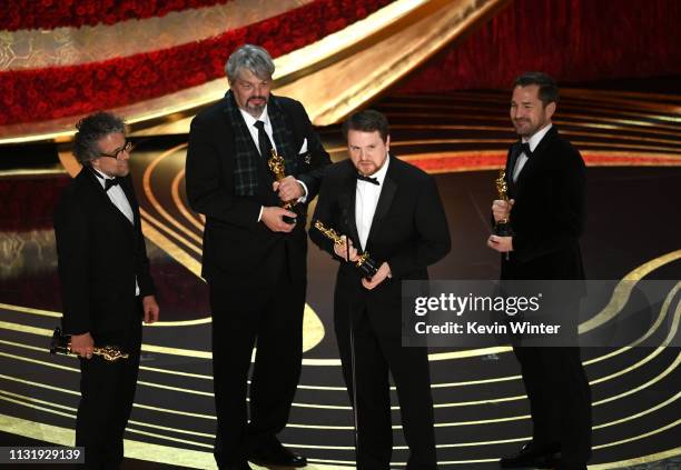 Paul Lambert, Ian Hunter, J. D. Schwalm and Tristan Myles accept the Best Visual Effects award for "First Man" onstage during the 91st Annual Academy...