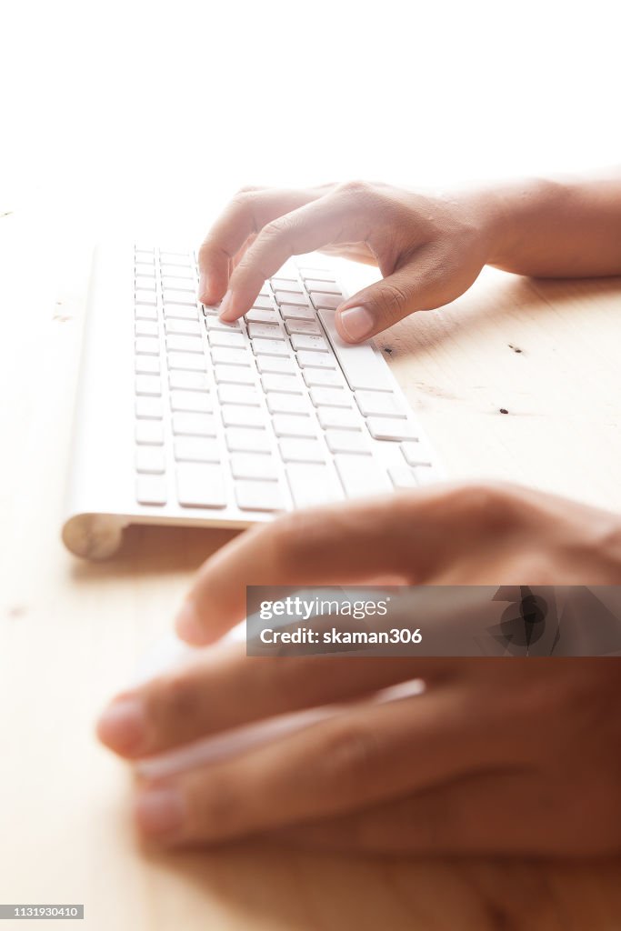 Hand Holding Computer Mouse And Click With Keyboard Computer High-Res ...